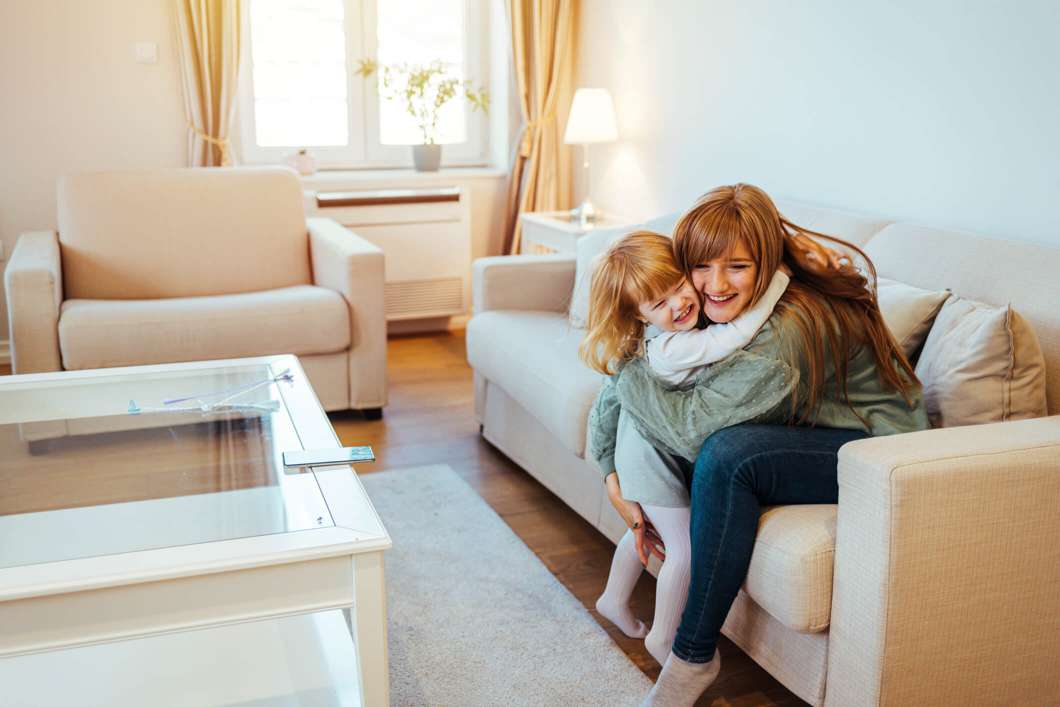 mother and daughter hugging