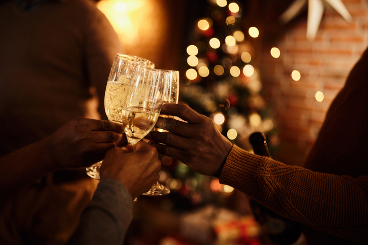 people drinking during a holiday party